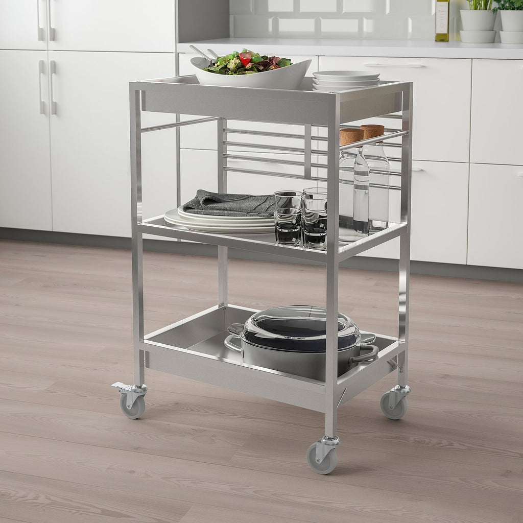 KUNGSFORS silver 3-tier kitchen trolley holds dishes, pots, and food. Mobile with casters, fits well in modern kitchens.