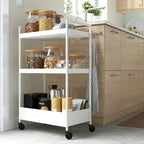 NISSAFORS: 3-tier kitchen cart with food items.