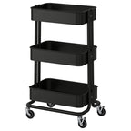 Black ikea RÅSKOG cart with 3 shelves and wheels for versatile storage.